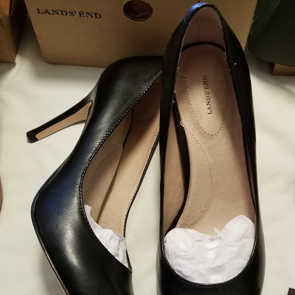 4 pairs of never worn heels, size 7 1/2 B.